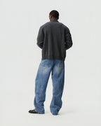 Twisted Denim Pants — product view; model: Heider