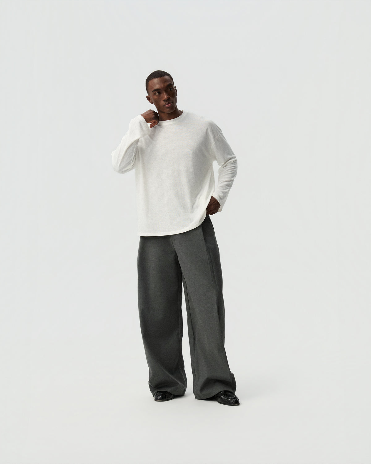 Pleated Barrel Trousers — styling view
