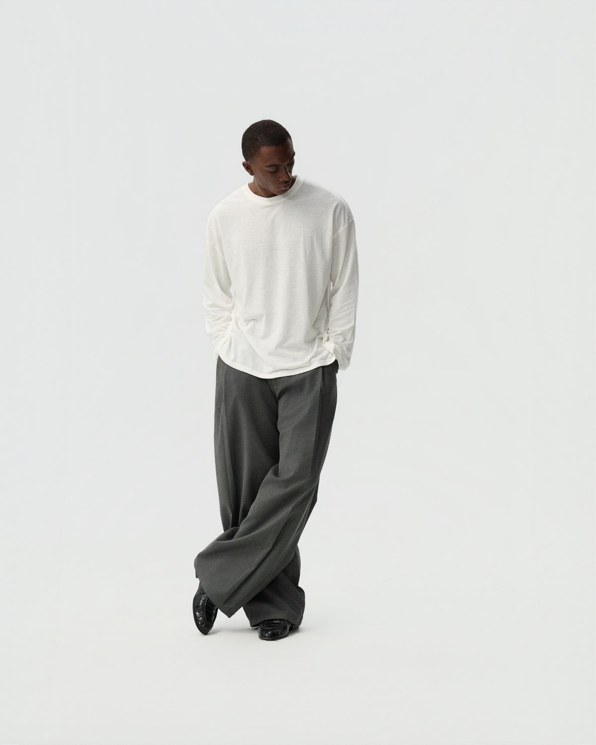 Pleated Barrel Trousers — styling view